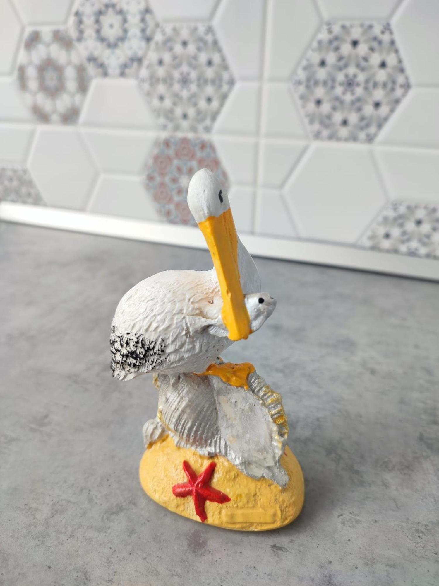 Pelicanul